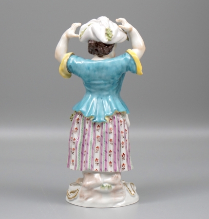 Meissen Figur Gärtnerkind mit Bündel.