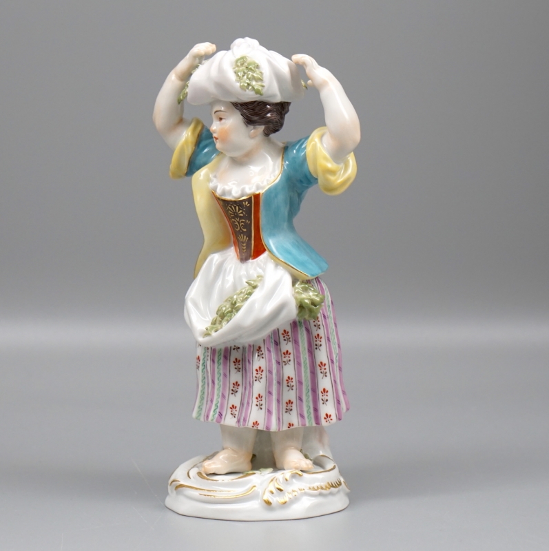 Meissen Figur Gärtnerkind mit Bündel.