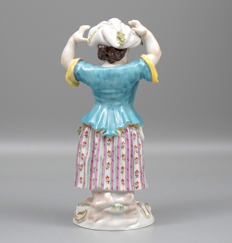 Meissen Figur Gärtnerkind mit Bündel.