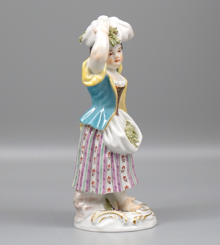 Meissen Figur Gärtnerkind mit Bündel.